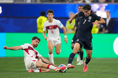 United States' Giovanni Reyna (7) and Turkey's Orkun Kokcu vie for the ball during a World Cup Group D soccer match in Inglewood, Calif., near Los Angeles, Thursday, June 25, 2026.