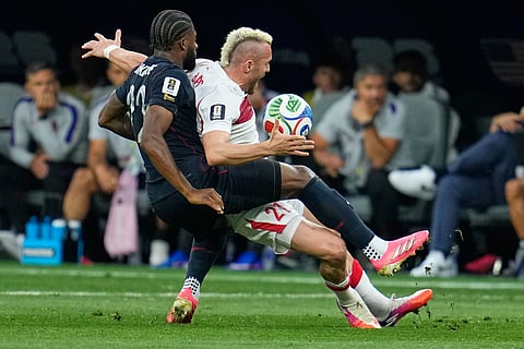 United States' Mark McKenzie (22) and Turkey's Baris Alper Yilmaz (21) battle for the ball during the World Cup Group D soccer match between Turkey and the United States in Inglewood, Calif., near Los Angeles, Thursday, June 25, 2026.