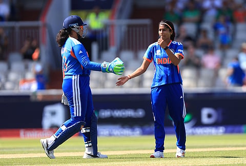 India's Nandani Sharma, right, celebrates the wicket of Bangladesh's Juairiya Ferdous during the ICC Women's T20 World Cup cricket match between India and Bangladesh in Manchester, England.