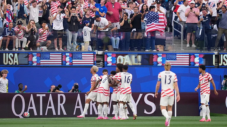 USA players celebrate after their first goal during the World Cup Group D soccer match between the United States and Paraguay in Inglewood, Calif., near Los Angeles, Friday, June 12, 2026. - AP Photo/Mark J. Terrill