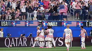 AP Photo/Mark J. Terrill : USA players celebrate after their first goal during the World Cup Group D soccer match between the United States and Paraguay in Inglewood, Calif., near Los Angeles, Friday, June 12, 2026.