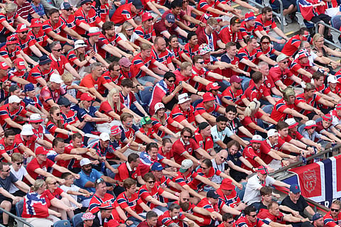 Norwegian fans perform a viking boat row during the World Cup Group I soccer match between Norway and France in Foxborough