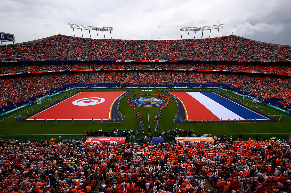 National flags are displayed as teams enter the field ahead of the World Cup Group F soccer match between Tunisia and the Netherlands in Kansas City, Mo., Thursday, June 25, 2026. - (AP Photo/Reed Hoffmann)