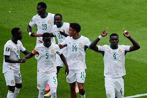 Senegal's Abdoulaye Seck (4) celebrates scoring their first goal during the World Cup Group I soccer match between Senegal and Iraq in Toronto, Friday, June 26, 2026.