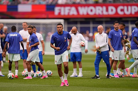 France's Kylian Mbappe,  on the pitch for the warmup before the World Cup Group I soccer match