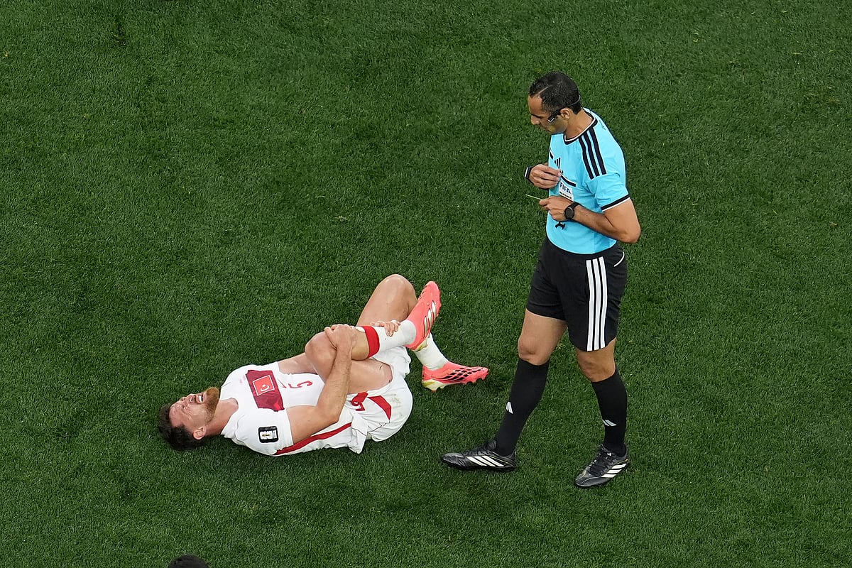 Turkiye vs USA, FIFA World Cup 2026 Group D Salih Ozcan in pain AP Photo