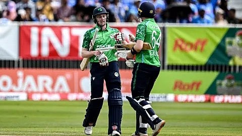 Lorcan Tucker and Gareth Delany with a 64-run partnership, IRE post 182/9 (20) - AP