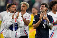 | Photo: AP/Gregory Bull : United States' Christian Pulisic (10) and teammate Cristian Roldan, left, react following during the World Cup Group D soccer match between Turkey and the United States in Inglewood, California, near Los Angeles.
