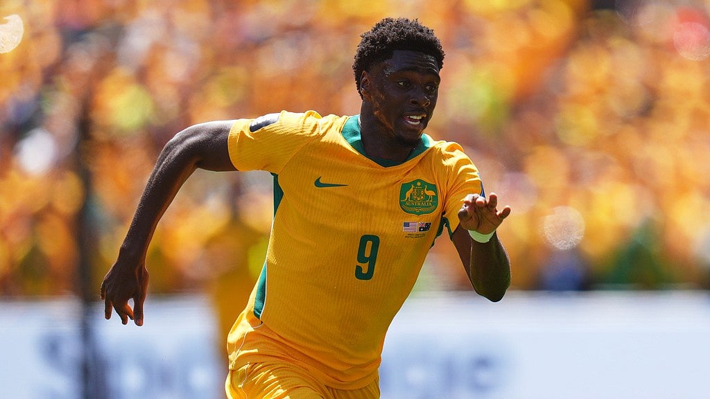 Australia's Mohamed Toure (9) runs during the World Cup Group D soccer match between the United States and Australia in Seattle. - Manu Fernandez/AP Photo