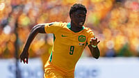 Manu Fernandez/AP Photo : Australia's Mohamed Toure (9) runs during the World Cup Group D soccer match between the United States and Australia in Seattle.