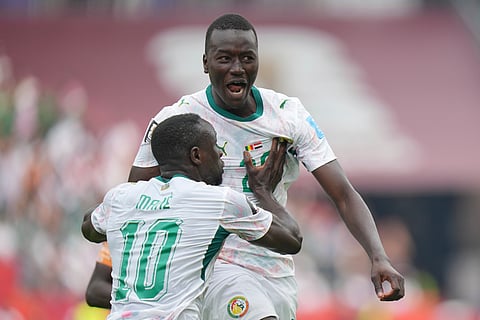 Senegal's Pape Gueye, right, and Sadio Mane (10) celebrate their third goal during the World Cup Group I soccer match between Senegal and Iraq in Toronto, Friday, June 26, 2026.