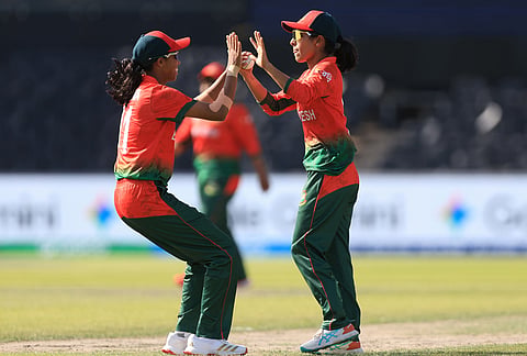 Bangladesh's Rabeya Khan, right, celebrates with Shorna Akter after taking the catch of India's Yastika Bhatia during the ICC Women's T20 World Cup cricket match between India and Bangladesh in Manchester, England.