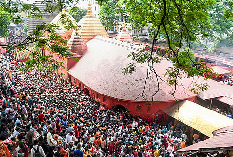 People throng the premises of Kamakhya Temple to offer prayers after the sacred doors of the temple re-opens, concluding the four-day annual Ambubachi Mela, in Guwahati, Assam.
