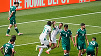 (AP Photo/Olivia White) : Senegal's Pape Gueye (26) celebrates with Iliman Ndiaye (13) after scoring the team's fourth goal during the World Cup Group I soccer match between Senegal and Iraq in Toronto, Friday, June 26, 2026.