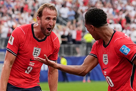 England's Harry Kane (9) celebrates with England's Jude Bellingham (10) after scoring their second goal during the World Cup Group L soccer match between Panama and England in East Rutherford