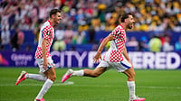 (AP Photo/Petr Josek) : Croatia's Nikola Vlasic (13) celebrates after scoring his side's second goal during the World Cup Group L soccer match between Croatia and Ghana in Philadelphia, Saturday, June 27, 2026.