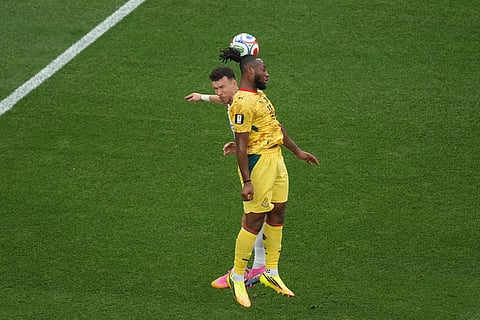 Croatia's Ivan Perisic (14) battles for a header with Ghana's Antoine Semenyo (11) during the World Cup Group L soccer match between Croatia and Ghana in Philadelphia, Saturday, June 27, 2026.
