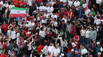 AP Photo/Maddy Grassy : Fans cheer during the World Cup Group G soccer match between Egypt and Iran in Seattle, Friday, June 26, 2026.