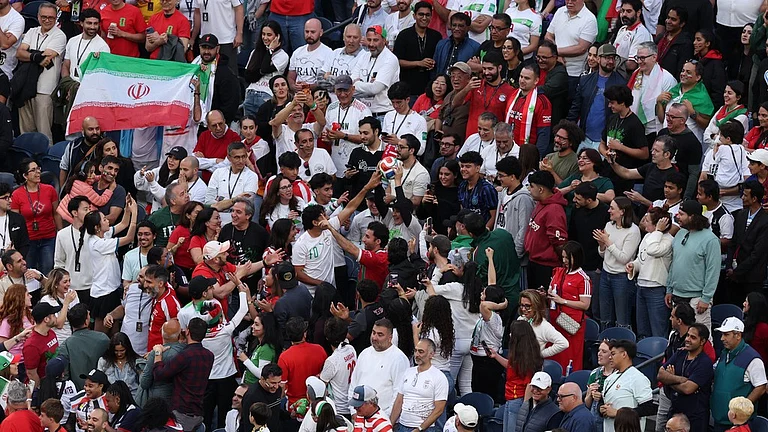 Fans cheer during the World Cup Group G soccer match between Egypt and Iran in Seattle, Friday, June 26, 2026. - AP Photo/Maddy Grassy