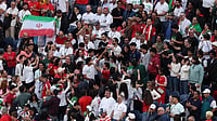 AP Photo/Maddy Grassy : Fans cheer during the World Cup Group G soccer match between Egypt and Iran in Seattle, Friday, June 26, 2026.