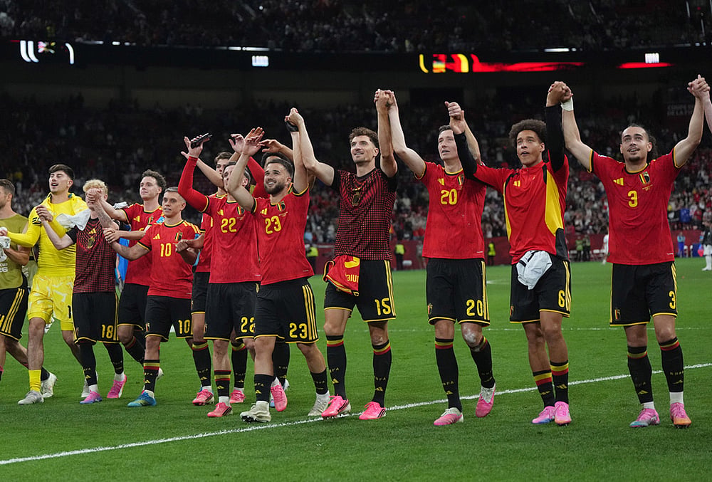 Belgium celebrates the win over New Zealand after their World Cup Group G soccer match in Vancouver, British Columbia. - | Photo: Darryl Dyck/The Canadian Press via AP