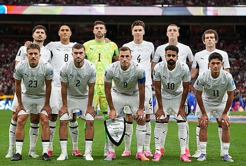 New Zealand players pose for a team photo ahead of the World Cup Group G soccer match between New Zealand and Belgium in Vancouver, British Columbia.