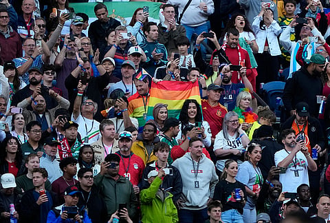 Fans react as they wait for the start of the World Cup Group G soccer match between Egypt and Iran in Seattle.