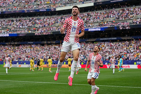 Croatia's Petar Sucic (17) celebrates after scoring his side's opening goalbduring the World Cup Group L soccer match between Croatia and Ghana in Philadelphia, Saturday, June 27, 2026.