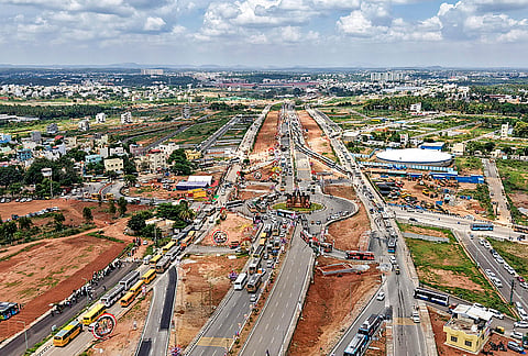 An aerial view of the newly constructed SM Krishna Road, a 10-lane, 10.76-km signal-free and toll-free corridor connecting Kadabagere Cross on Magadi Road to Challaghatta Metro Station, inaugurated by Chief Minister DK Shivakumar, in Bengaluru coinciding with the 517th Nadaprabhu Kempegowda Jayanti. 
