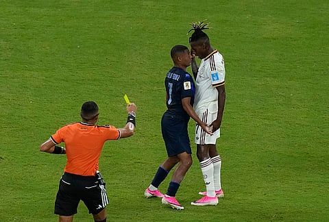 Spain's Nico Williams (17) argues with Uruguay's Nicolas de la Cruz (7) during the World Cup Group H soccer match between Uruguay and Spain in Zapopan, near Guadalajara, Mexico.