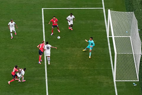 England's Harry Kane (9) scores their second goal during the World Cup Group L soccer match between Panama and England in East Rutherford