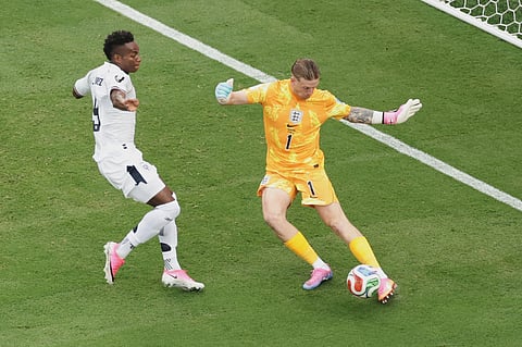 England goalkeeper Jordan Pickford (1) kicks the ball Panama's Tomas Rodriguez (9) during the World Cup Group L soccer match between Panama and England in East Rutherford