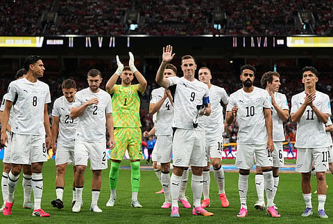 New Zealand players react ahead of the World Cup Group G soccer match between New Zealand and Belgium in Vancouver, British Columbia.
