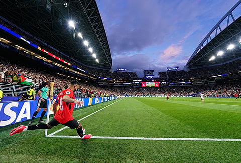 Egypt's Mohamed Salah (10) takes a corner kick during the World Cup Group G soccer match between Egypt and Iran in Seattle.