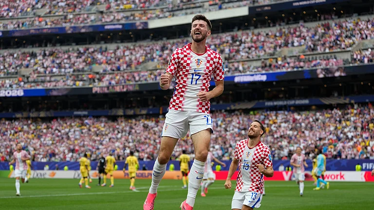 Croatia's Petar Sucic (17) celebrates after scoring his side's opening goalbduring the World Cup Group L soccer match between Croatia and Ghana in Philadelphia, Saturday, June 27, 2026. - (AP Photo/Matt Slocum)