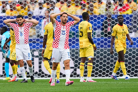 Croatia's Nikola Vlasic (13), center, and his teammate Croatia's Mateo Kovacic (8) react after missing a scoring chance during the World Cup Group L soccer match between Croatia and Ghana in Philadelphia, Saturday, June 27, 2026.