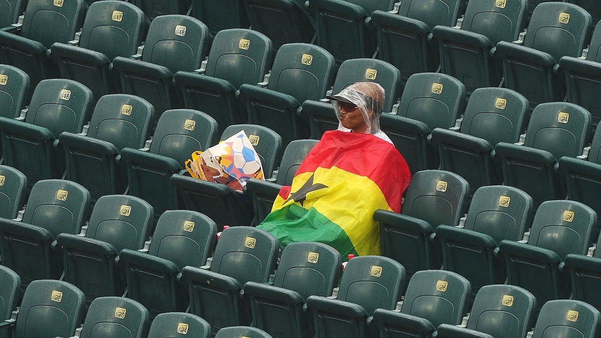 Ghana supporters stand in the rain before the World Cup Group L soccer match between Croatia and Ghana in Philadelphia, Saturday, June 27, 2026.  - (AP Photo/Matt Rourke)