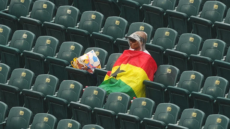 Ghana supporters stand in the rain before the World Cup Group L soccer match between Croatia and Ghana in Philadelphia, Saturday, June 27, 2026. - (AP Photo/Matt Rourke)