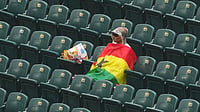 (AP Photo/Matt Rourke) : Ghana supporters stand in the rain before the World Cup Group L soccer match between Croatia and Ghana in Philadelphia, Saturday, June 27, 2026. 