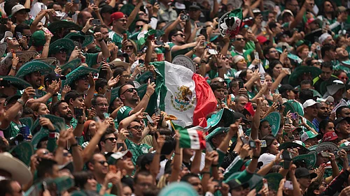AP Photo/Silvia Izquierdo : Mexican fans cheer before the World Cup Group A soccer match between Mexico and South Africa in Mexico City, Thursday, June 11, 2026.