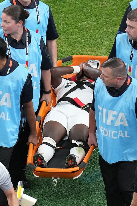 Saudi Arabia's Hassan Altambakti (5) reacts while being taken off the pitch on a stretcher during the World Cup Group H soccer match between Cape Verde and Saudi Arabia in Houston, Friday, June 26, 2026.
