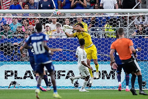 Cape Verde goalkeeper Vozinha (1) makes a save during the World Cup Group H soccer match between Cape Verde and Saudi Arabia in Houston.