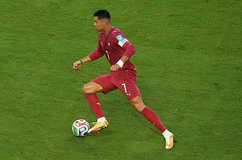 Portugal's Cristiano Ronaldo (7) controls the ball during the World Cup Group K soccer match between Colombia and Portugal in Miami Garden
