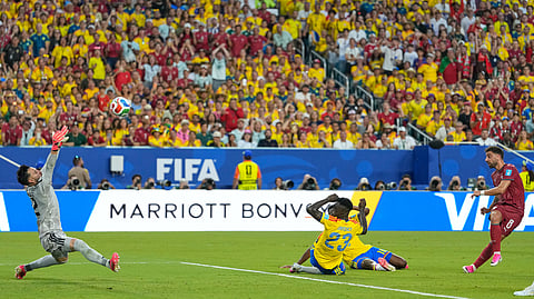 Colombia goalkeeper Camilo Vargas (12) saves a shot from Portugal's Bruno Fernandes (8) during the World Cup Group K soccer match between Colombia and Portugal in Miami Gardens