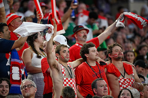 Austria fans stand for their national anthem during the World Cup Group J soccer match between Algeria and Austria in Kansas City, Mo., Saturday, June 27, 2026