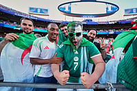 Algeria Vs Austria, FIFA World Cup: See Best Photos From Group J Decider At The Kansas City Stadium (AP Photo/Charlie Riedel) : Fans cheer ahead of a World Cup Group J soccer match between Algeria and Austria in Kansas City, Mo., Saturday, June 27, 2026