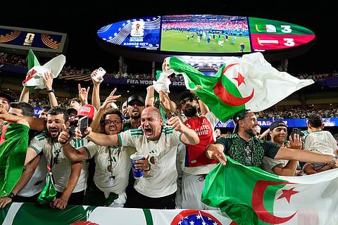 Algerian fans celebrate after the World Cup Group J soccer match between Algeria and Austria in Kansas City, Mo., Saturday, June 27, 2026.