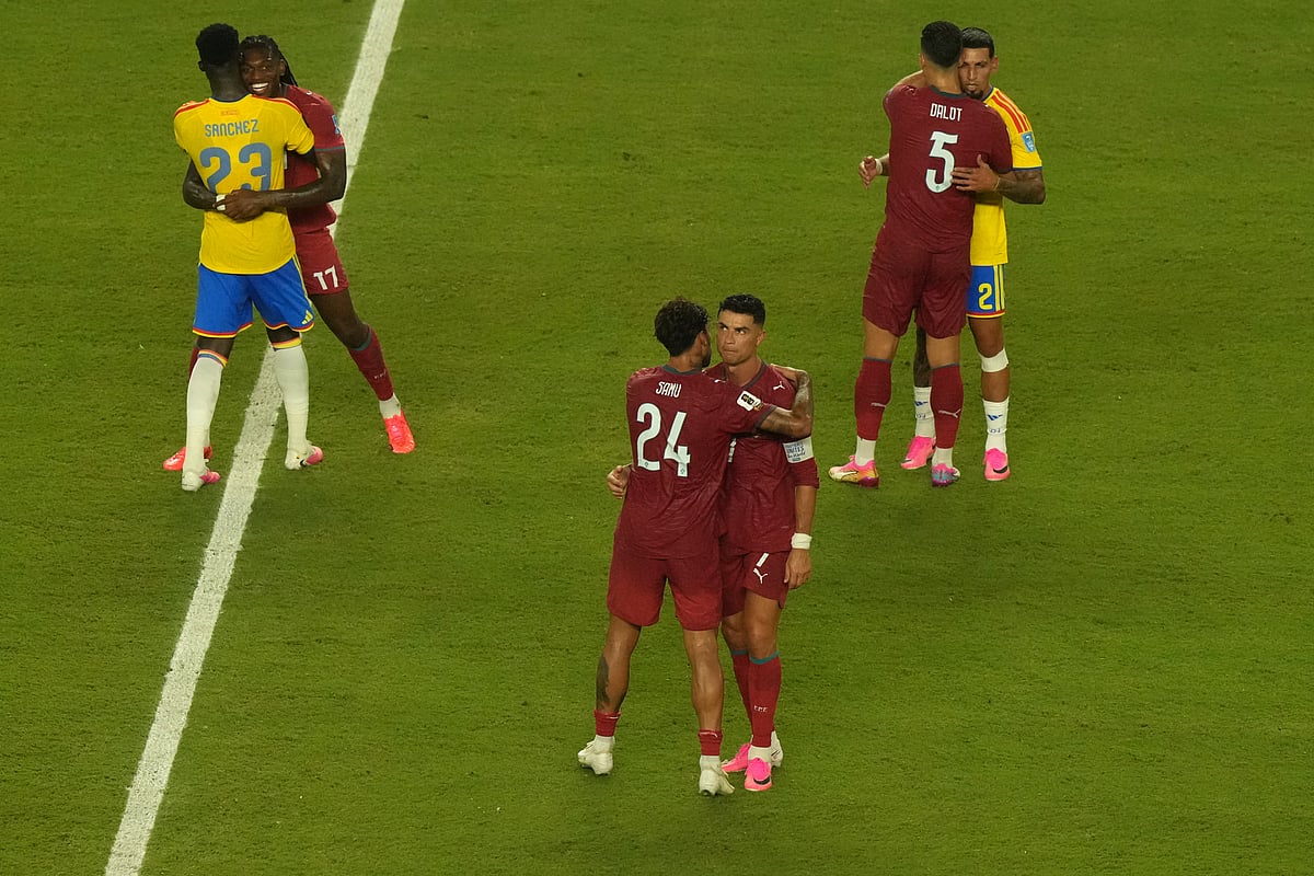 (AP Photo/Marta Lavandier) : Portugals Cristiano Ronaldo (7) embraces Samu Costa (24) after the World Cup Group K soccer match between Colombia and Portugal in Miami Gardens, Fla., Saturday, June 27, 2026