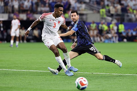 Argentina's Lionel Messi (10) tangles with Jordan's Abdallah Nasib (3) during the World Cup Group J soccer match between Jordan and Argentina in Arlington, Texas, near Dallas, Saturday, June 27, 2026.
