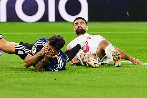 Argentina's Leonardo Balerdi, left, reacts after being fouled against by Jordan's Nizar Alrashdan to give away a penalty during the World Cup Group J soccer match in Arlington, Texas, near Dallas, Saturday, June 27, 2026